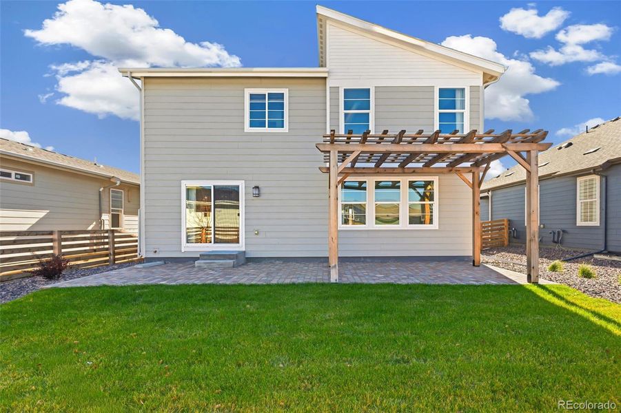 Exterior details and patio area of a home in Legato, Commerce City (Image 11).