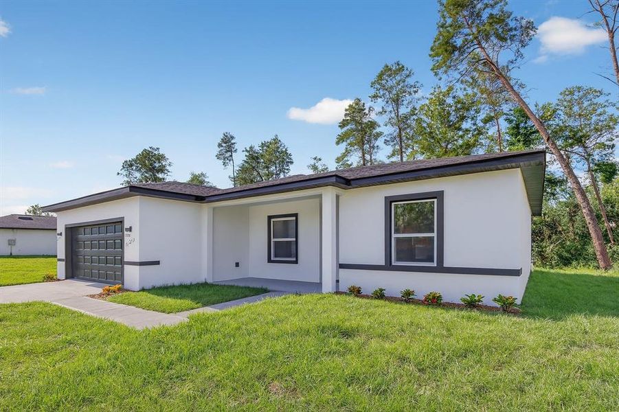 Exterior details and patio area of a home in , Ocala (Image 24).