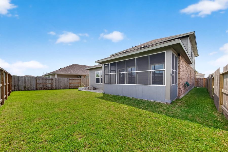 Exterior details and patio area of a home in Heights of Barbers Hill, Baytown (Image 25).