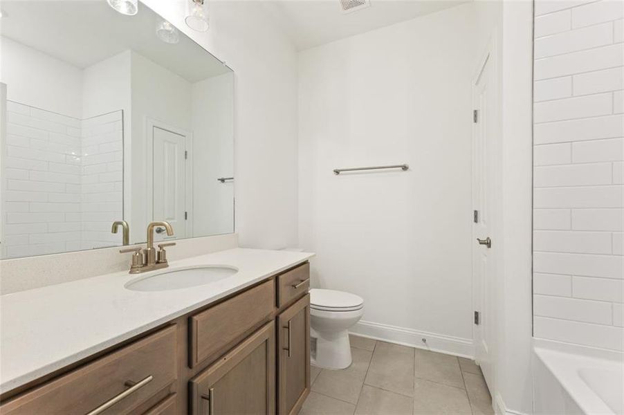 Furnished interior view inside a new home in The Courtyards of Franklin Goldmine, Cumming (Image 4).