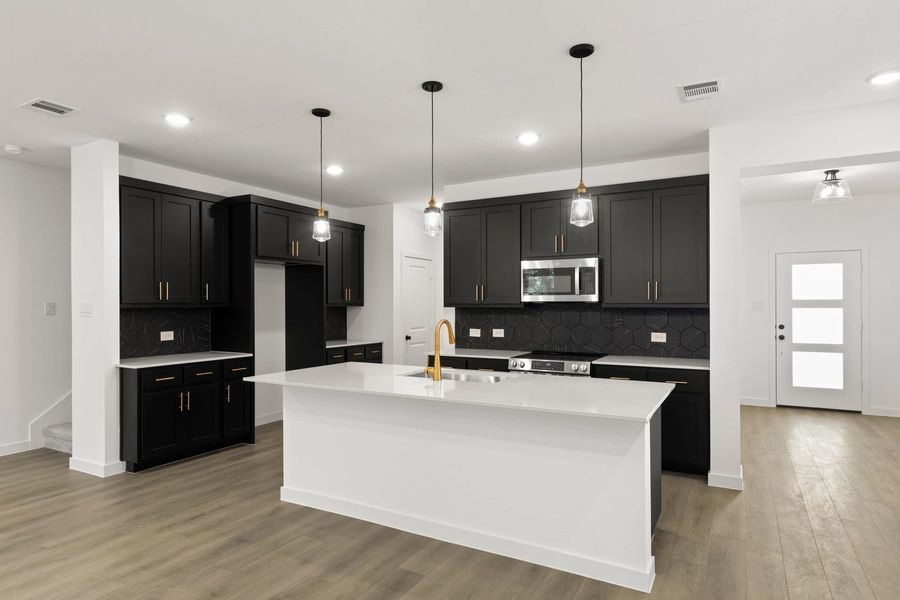 Kitchen featuring the Noir Collection Kitchen featuring the Noir Collection