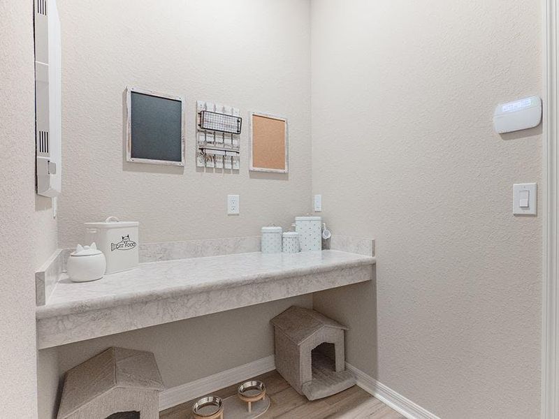 And, this mud room with a drop zone at the garage entry - Birch townhome by Highland Homes And, this mud room with a drop zone at the garage entry - Birch townhome by Highland Homes