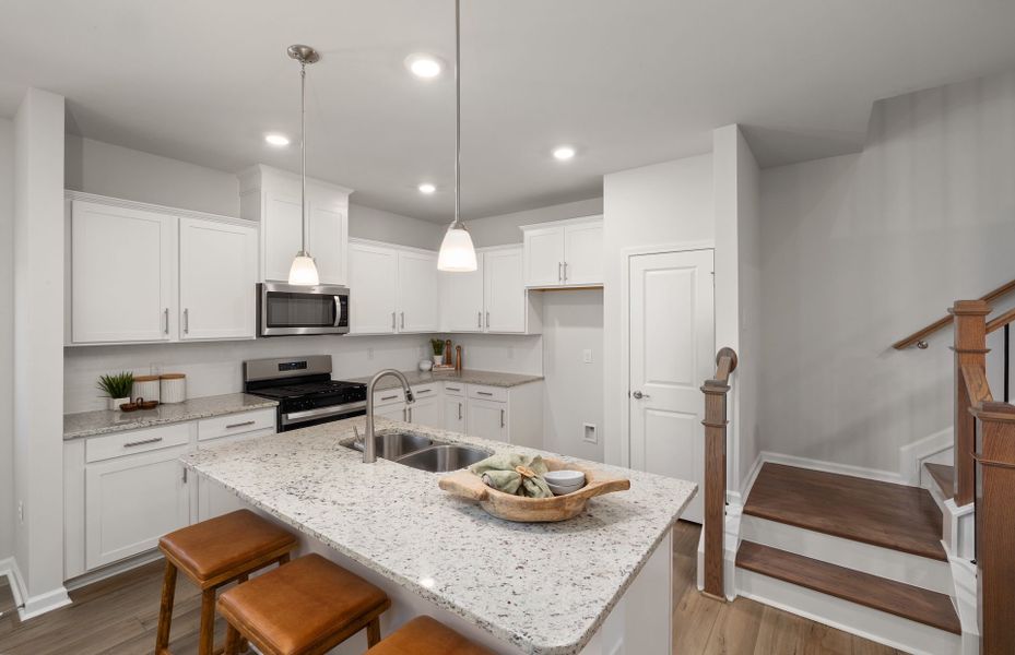 Furnished interior view inside a new home in Saunders Farm, Willow Spring (Image 7).