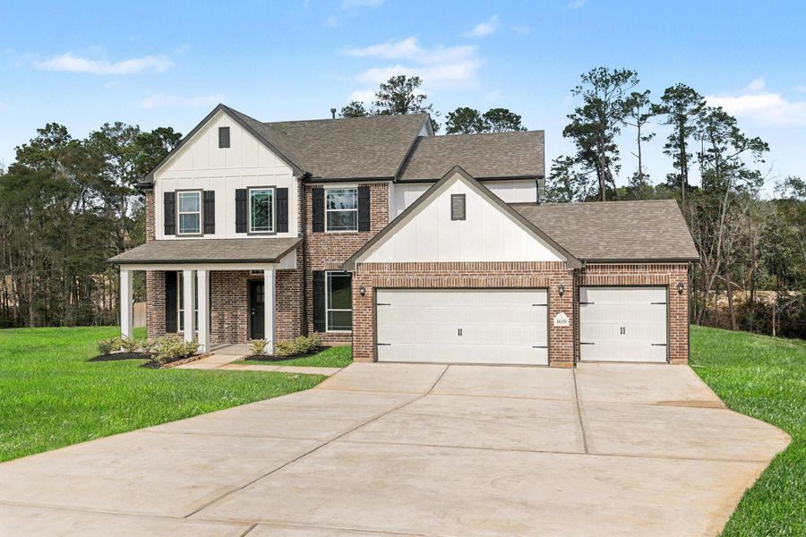 Front exterior of a new home in Oakwood Ranch, Willis, TX, highlighting curb appeal (Image 21). Front exterior of a new home in Oakwood Ranch, Willis, TX, highlighting curb appeal (Image 21).