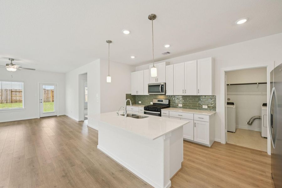 Furnished interior view inside a new home in Pine Lake Cove - Traditional Series, Montgomery (Image 14).