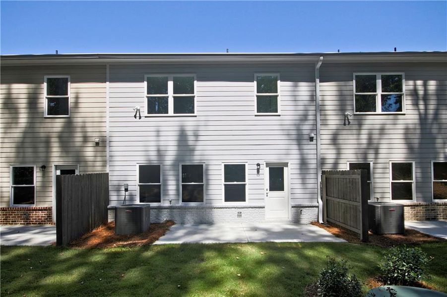 Exterior details and patio area of a home in River Walk Place, Lawrenceville (Image 3).