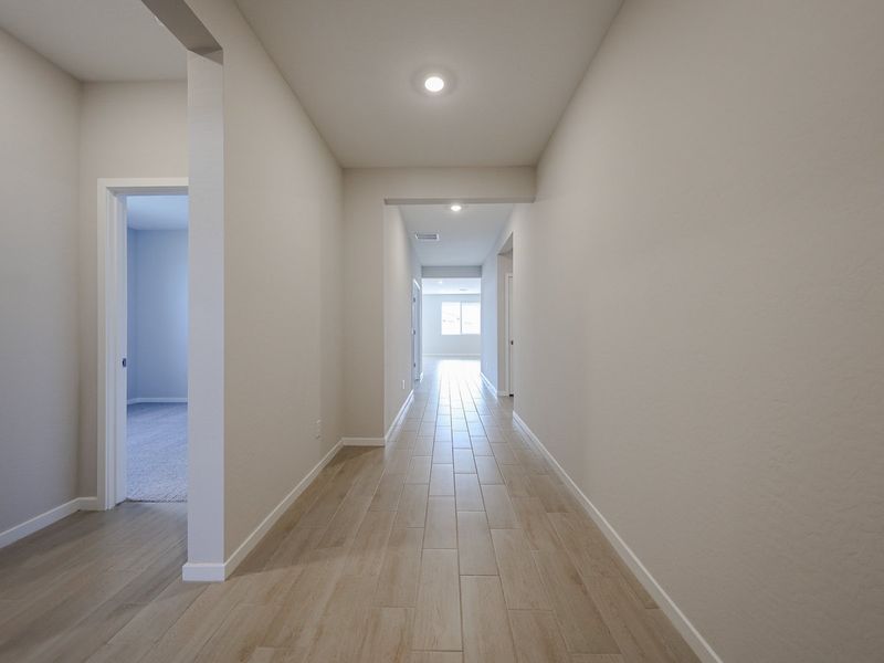 A long hallway with white walls. A long hallway with white walls.