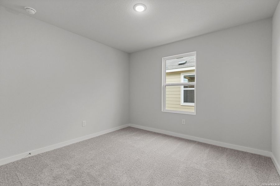 Spacious, unfurnished interior of a new home in Hacienda, San Antonio (Image 15).