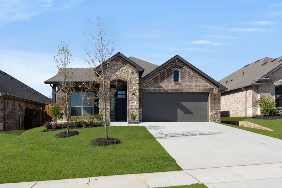 Front exterior of a new home in Waterford Park, Weatherford, TX, highlighting curb appeal (Image 19).