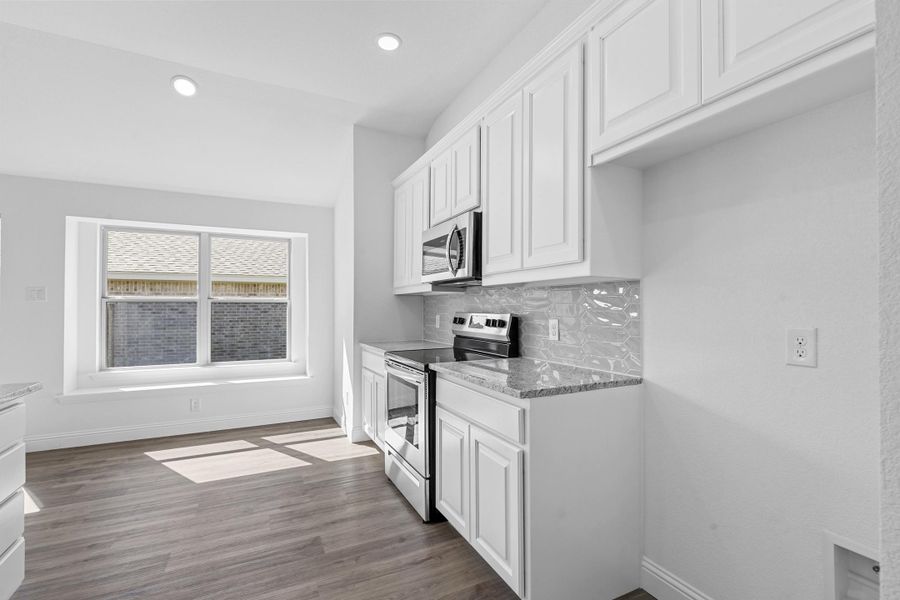 Representative furnished interior of a home built from the Hanover by Cheldan Homes in Craftsmen's Corner, Cleburne (Image 41).