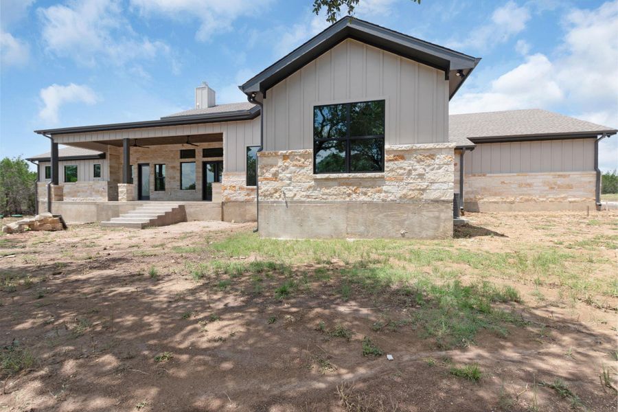 Front exterior of a new home in , Burnet, TX, highlighting curb appeal (Image 2). Front exterior of a new home in , Burnet, TX, highlighting curb appeal (Image 2).