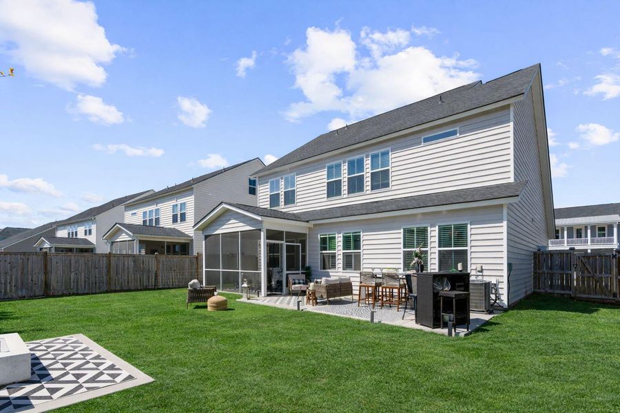 Exterior details and patio area of a home in Sweetgrass at Summers Corner, Summerville (Image 27).