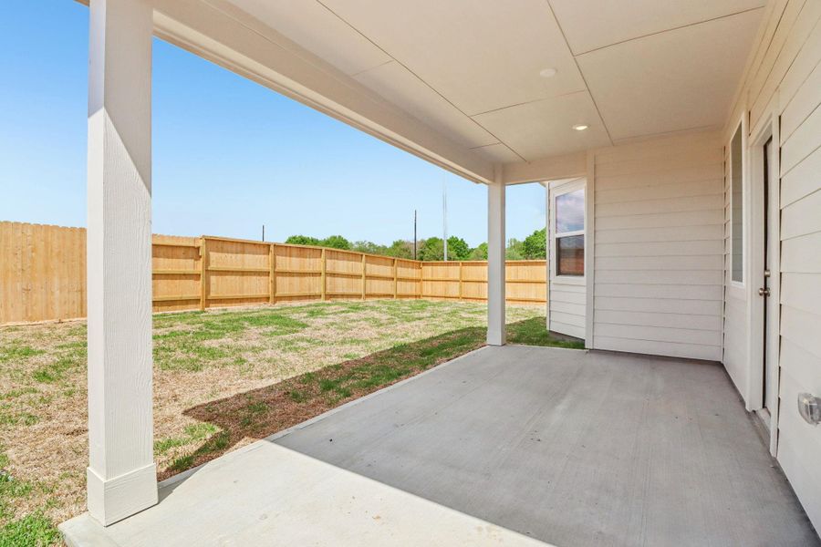 Exterior details and patio area of a home in Landing Meadows - Premier Series, New Caney (Image 1). Exterior details and patio area of a home in Landing Meadows - Premier Series, New Caney (Image 1).