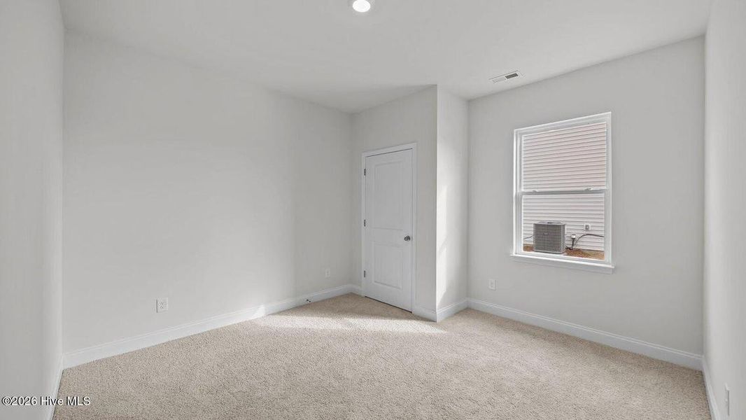 Spacious, unfurnished interior of a new home in Villa Grande, Winterville (Image 14).