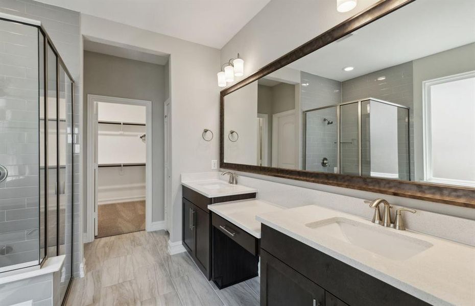 Owner's bath with oversized shower *real home pictured