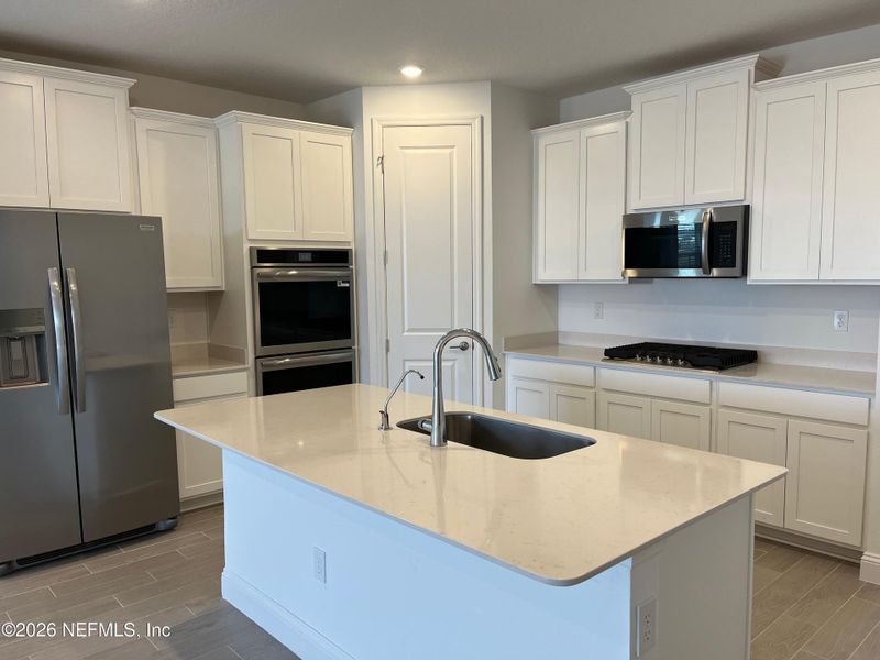 Furnished interior view inside a new home in Silver Falls Single Family at SilverLeaf, St. Augustine (Image 5).