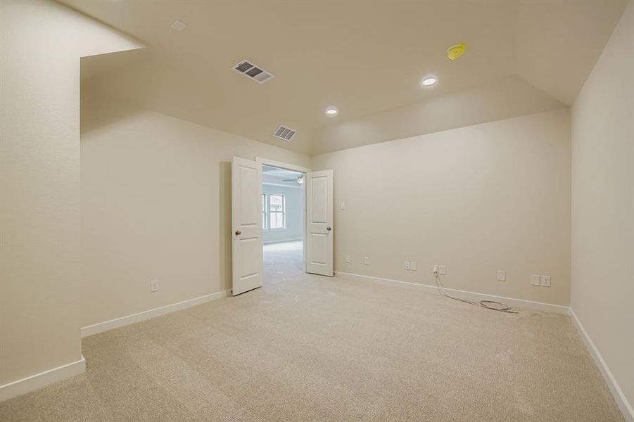 Media room with light carpet and recessed lighting Media room with light carpet and recessed lighting