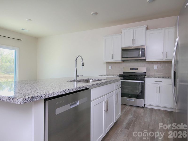 Furnished interior view inside a new home in Villas at Sherrills Ford, Terrell (Image 8).