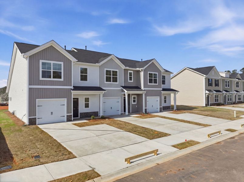 Representative exterior photo of a completed home built from the Ash 24 by McGuinn Homes in Towns at Lake Greenwood, Greenwood, SC (Image 18).