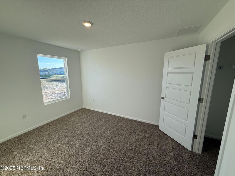 Spacious, unfurnished interior of a new home in The Arbors, Jacksonville (Image 36).