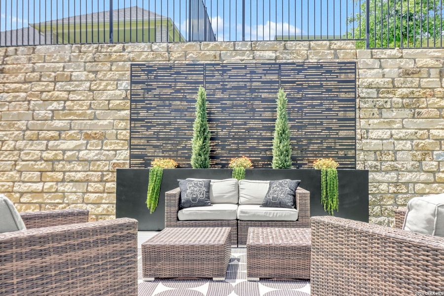 Exterior details and patio area of a home in Kissing Tree, San Marcos (Image 4).