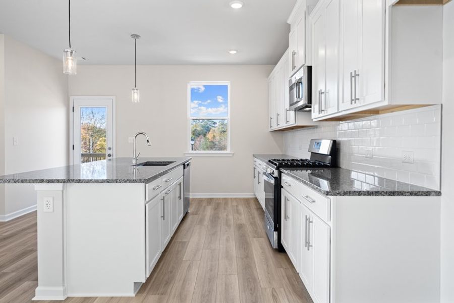 Representative furnished interior of a home built from the Collins by Taylor Morrison in Henson Square, Lawrenceville (Image 21).