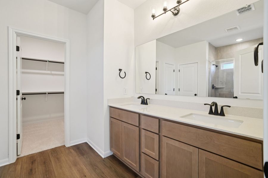Furnished interior view inside a new home in Village at Three Oaks, Seguin (Image 8).