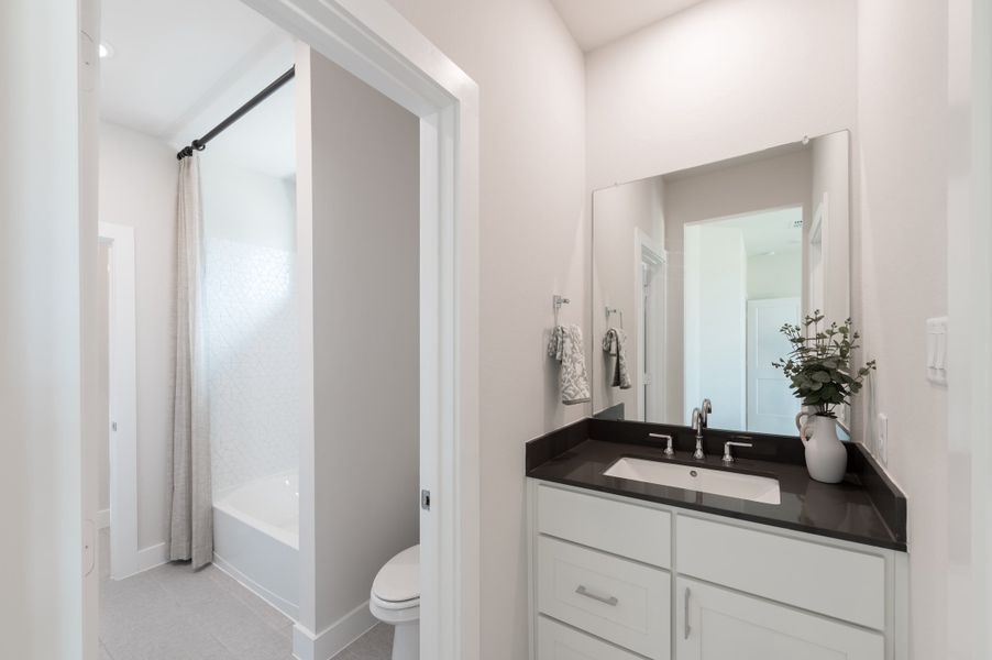 Representative furnished interior of a home built from the Bogata by Tri Pointe Homes in Harvest Green, Richmond (Image 43).