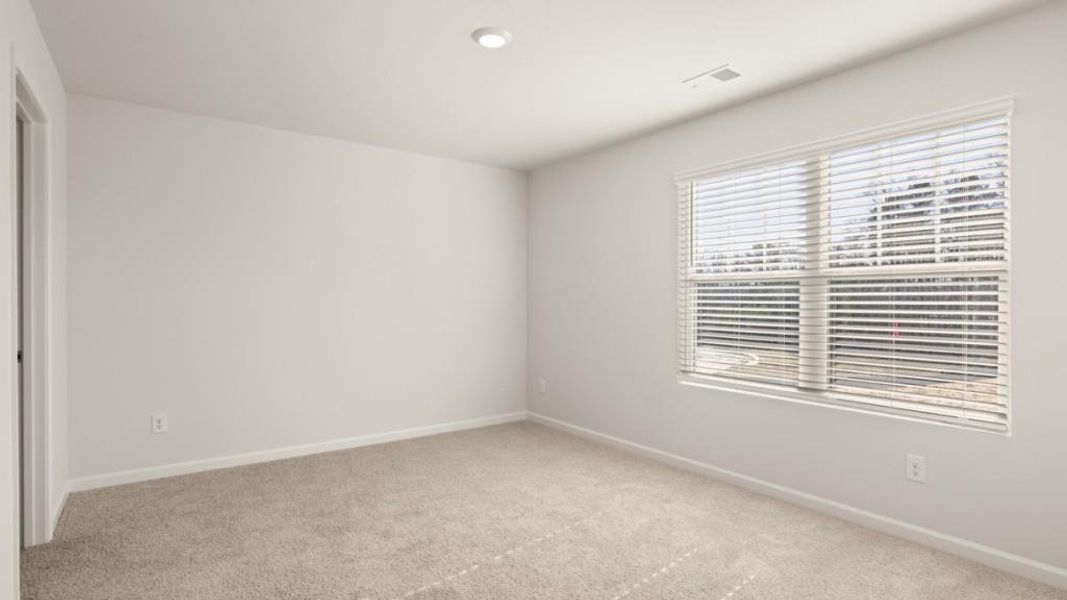 Spacious, unfurnished interior of a new home in Northwoods at Mirror Lake, Villa Rica (Image 22).