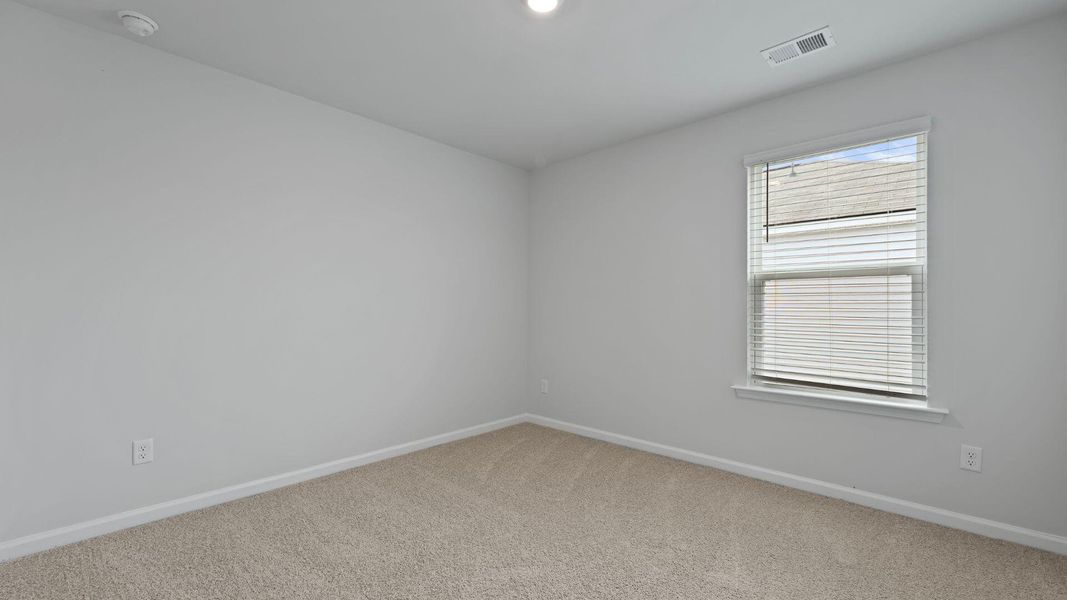 Spacious, unfurnished interior of a new home in Pine Hills at Cane Bay, Summerville (Image 20). Spacious, unfurnished interior of a new home in Pine Hills at Cane Bay, Summerville (Image 20).