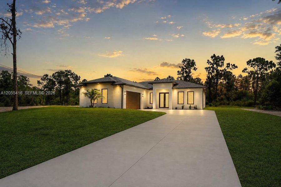 Front exterior of a new home in , Sebring, FL, highlighting curb appeal (Image 24). Front exterior of a new home in , Sebring, FL, highlighting curb appeal (Image 24).