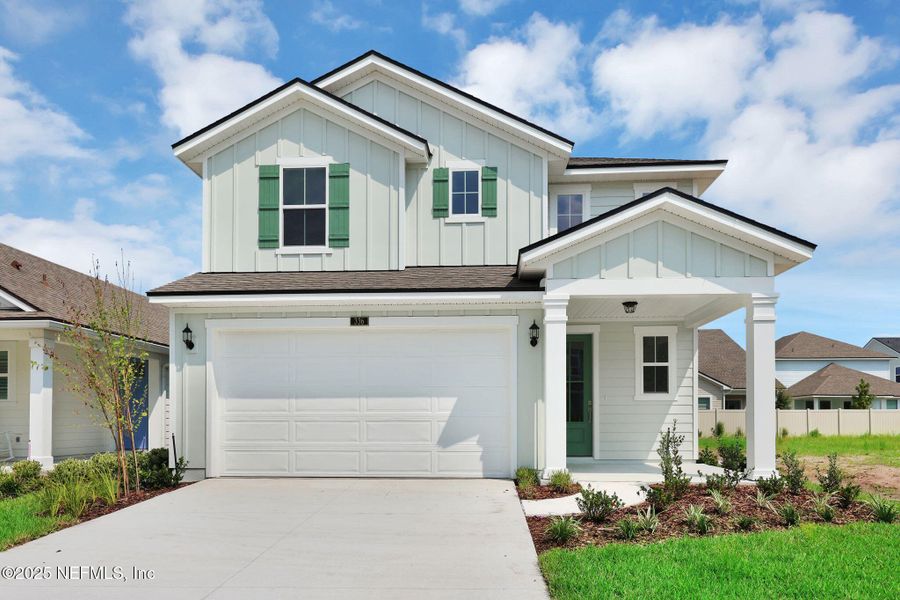 Front exterior of a new home in Seabrook Village at Nocatee, Ponte Vedra, FL, highlighting curb appeal (Image 24).