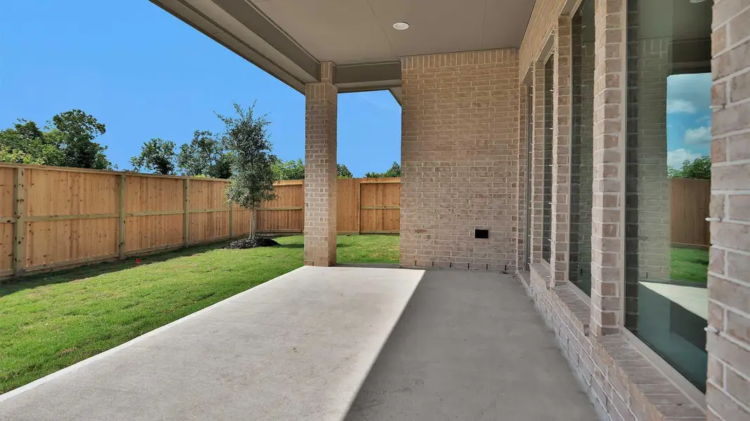 Exterior details and patio area of a home in Valencia, Manvel (Image 4). Exterior details and patio area of a home in Valencia, Manvel (Image 4).