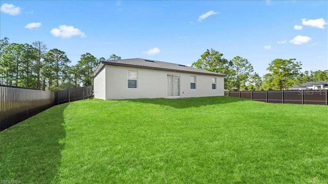 Exterior details and patio area of a home in , Lehigh Acres (Image 3).