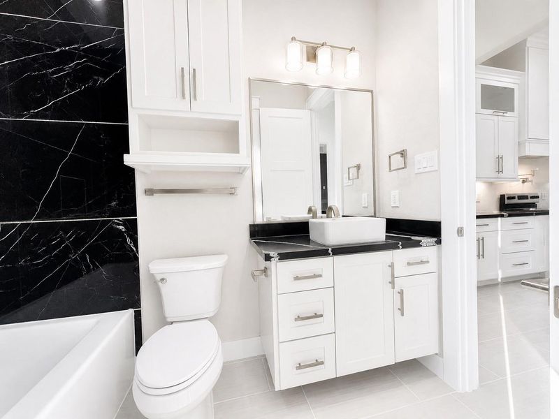 Guest bathroom as well as the Bathroom for the Home Office/4th Bedroom.