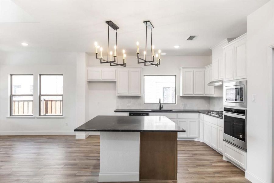 Furnished interior view inside a new home in Meadow Run, Melissa (Image 5).