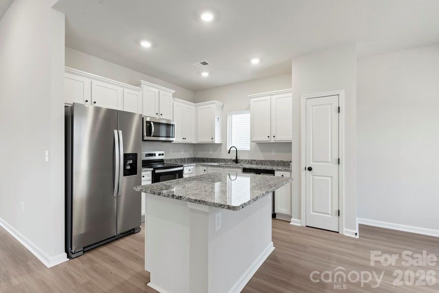 Furnished interior view inside a new home in Knights Bridge, Richburg (Image 3).