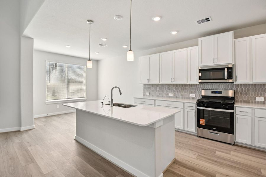 Photo is not of the actual home, but is an inspirational photo of builder’s model home and may depict options, furnishings, and/or decorator features that are not included