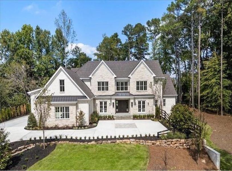 Front exterior of a new home in , Milton, GA, highlighting curb appeal (Image 1). Front exterior of a new home in , Milton, GA, highlighting curb appeal (Image 1).