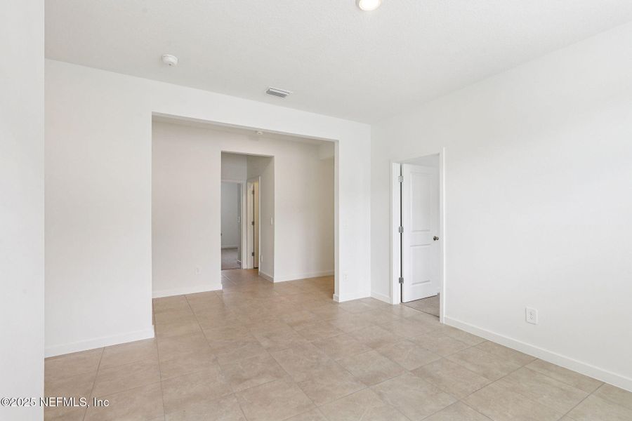 Spacious, unfurnished interior of a new home in Lakes at Bella Lago - Signature Series, Green Cove Springs (Image 15).