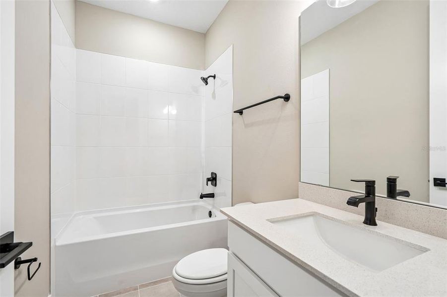 Furnished interior view inside a new home in Legends Preserve - Signature Series, Daytona Beach (Image 15).