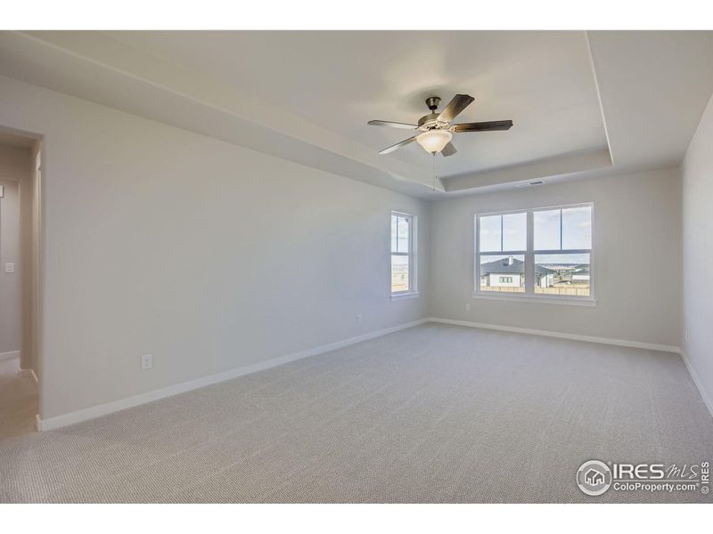 Spacious, unfurnished interior of a new home in RainDance National 60/70, Windsor (Image 25).