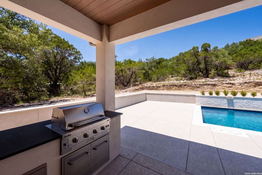 Exterior details and patio area of a home in , Boerne (Image 36).