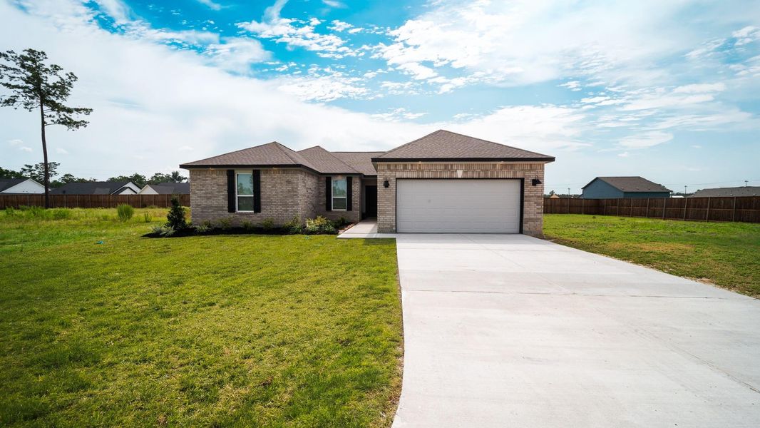 Front exterior of a new home in , Conroe, TX, highlighting curb appeal (Image 2). Front exterior of a new home in , Conroe, TX, highlighting curb appeal (Image 2).