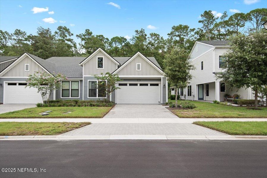 Front exterior of a new home in , Jacksonville, FL, highlighting curb appeal (Image 18). Front exterior of a new home in , Jacksonville, FL, highlighting curb appeal (Image 18).