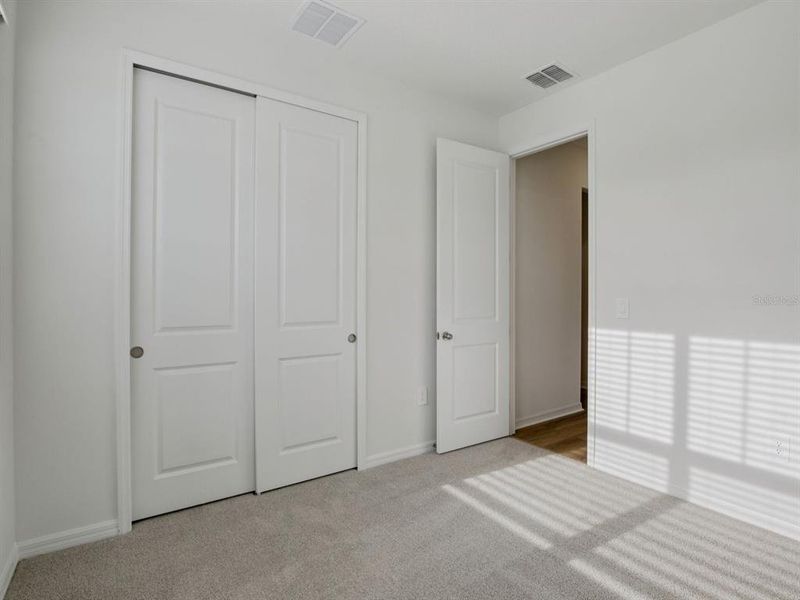 Spacious, unfurnished interior of a new home in Coasterra - Reserve Series, Palmetto (Image 13).