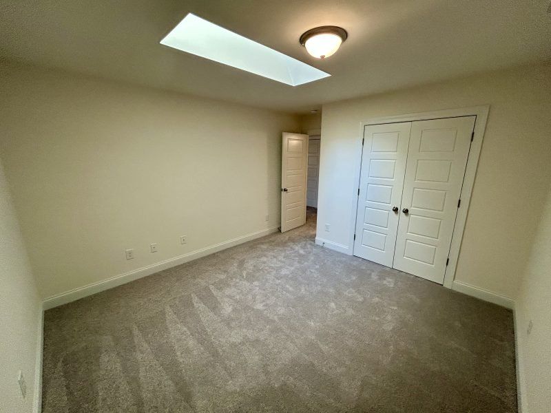 Spacious, unfurnished interior of a new home in Trellises, High Point (Image 20).