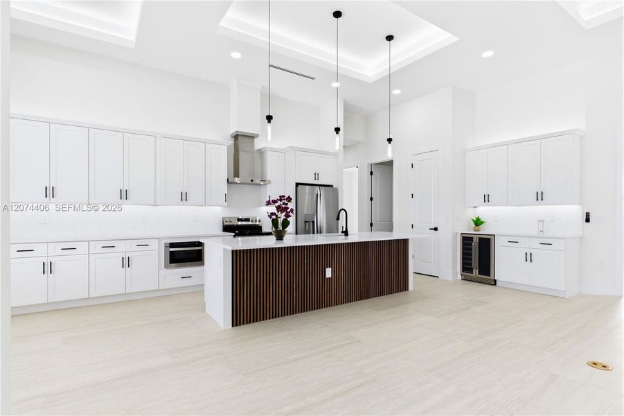 STUNNING CHEF’S KITCHEN w/ sophisticated CUSTOM CABINETRY w/ crisp WHITE SHAKER CABINETRY. STUNNING CHEF’S KITCHEN w/ sophisticated CUSTOM CABINETRY w/ crisp WHITE SHAKER CABINETRY.