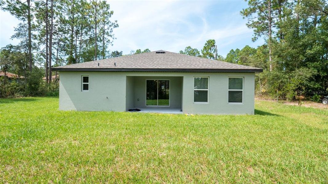 Front exterior of a new home in , Citrus Springs, FL, highlighting curb appeal (Image 17). Front exterior of a new home in , Citrus Springs, FL, highlighting curb appeal (Image 17).