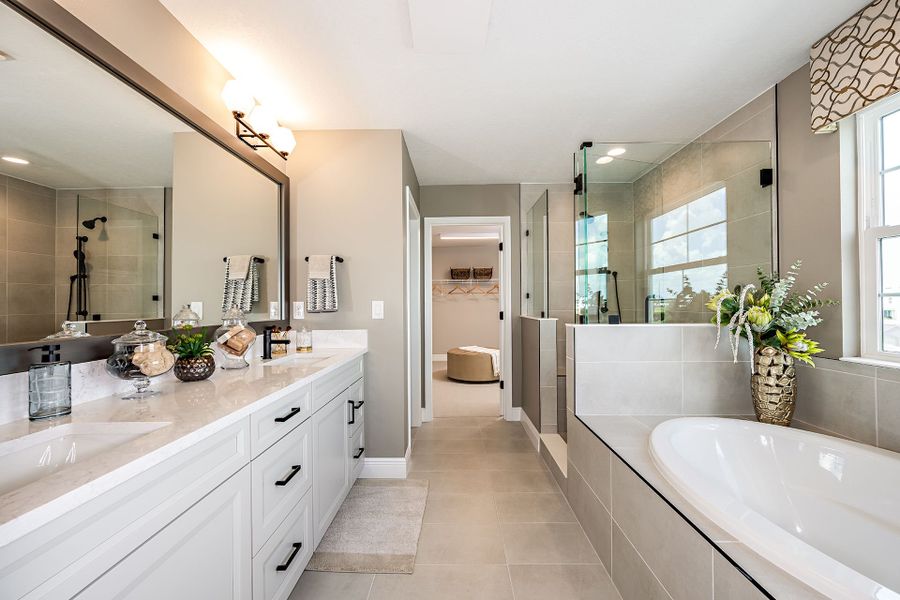 Representative furnished interior of a home built from the Pelican by Homes by WestBay in Crosswind Ranch, Parrish (Image 40).